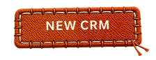 Stitched orange fabric label reading “New CRM”.